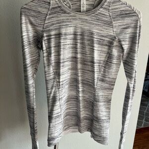 Lululemon long sleeve Hold Tight long sleeve shirt! NEVER WORN!